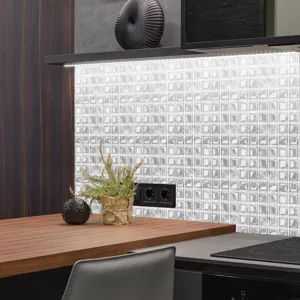 Close-up detail of 3d mosaic tile sticker showing realistic textured square pattern design for wall.