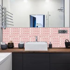 Close up view of the pink 3d mosaic tile sticker applied on bathroom wall, self adhesive diy decor.