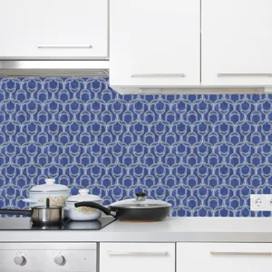 Self-adhesive blue mosaic kitchen tile sticker waterproof PVC wall decor for home remodel.