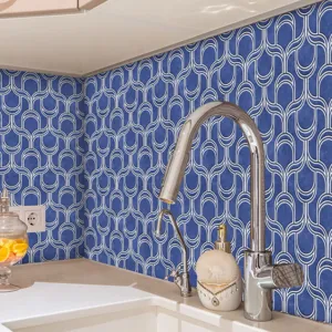 Blue geometric mosaic wall tile sticker detail, self-adhesive PVC, kitchen decor close-up view.