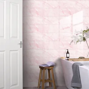 Pink marble tile stickers detail view showing crystal textured laminated wall decor for home.