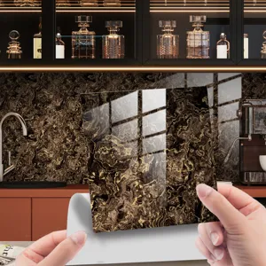 Detail view of black gold marble tile sticker, crystal texture surface, kitchen backsplash decor.