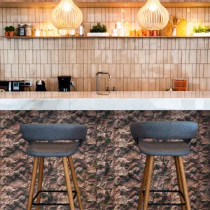 Detailed view of faux marble stone texture wallpaper applied on kitchen counter island, modern decor.