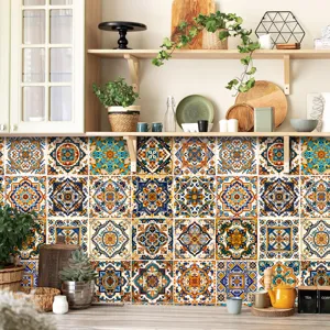 Moroccan style self-adhesive tile sticker detail, vintage blue and orange wall decor for home.