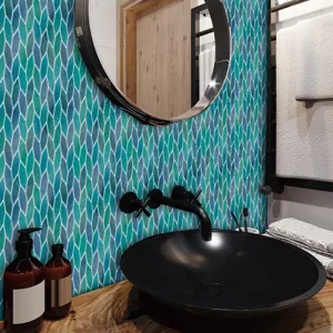 Detail shot of blue-green mosaic tile sticker in bathroom, waterproof self-adhesive wall decor.