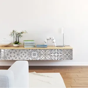 Moroccan vintage tile sticker detail showing decorative pattern on modern cabinet surface.