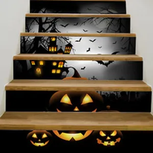 Close-up detail of Halloween stair stickers featuring glowing pumpkins and spooky castle.