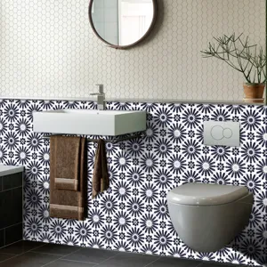 Detailed bathroom scene featuring waterproof self-adhesive mosaic tile stickers for interior decor.