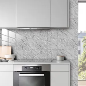 Detailed shot of grey marble texture crystal film tile sticker for modern kitchen wall decor.
