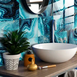 Detail view of blue marble tile sticker in bathroom sink scene, self-adhesive wall decor.