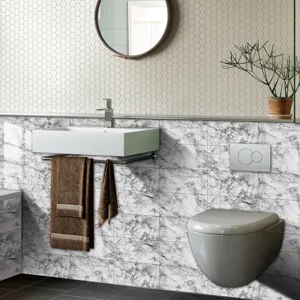 Detailed view of marble pattern wall sticker in modern bathroom interior design scene.