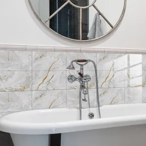 Detail shot of white marble pattern crystal film tile sticker applied on bathroom wall surface.