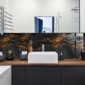 Black and gold marble texture wall sticker detail showing the waterproof crystal film surface.