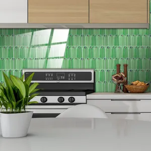 Kitchen wall sticker detail showing green peacock feather pattern and crystal film finish effect.