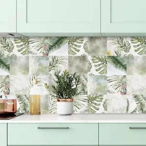 Adesivi per piastrelle impermeabili con foglie tropicali per paraschizzi di cucina.