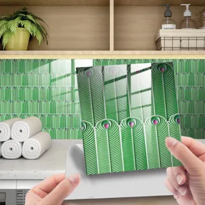 Peel and stick tile sticker with crystal epoxy finish and green peacock feather pattern for decor.