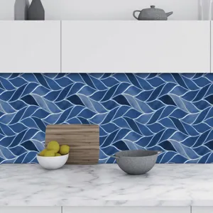 Self-adhesive PVC tile sticker, blue wave pattern waterproof wall decor for kitchen.