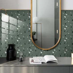 Detailed view of green terrazzo wall sticker film in a modern home interior scene.
