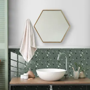 Detail view of green terrazzo pattern wall tile sticker in modern bathroom scene decor.