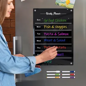Transparent acrylic magnetic weekly planner board for refrigerator with dry erase markers.