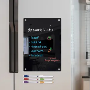 Detailed scene of transparent acrylic magnetic dry erase board on refrigerator for kitchen notes.
