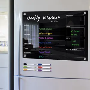 Clear acrylic magnetic weekly planner board for fridge with dry erase markers and calendar layout.
