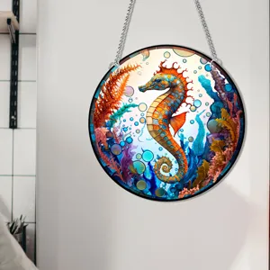 Closeup of the vibrant circular seahorse hanging wall art with detailed coral and metal chain.