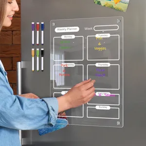 Clear acrylic magnetic weekly planner board detail showing smooth writing surface and markers.