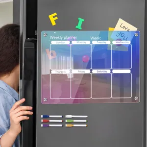 Colorful acrylic weekly planner magnetic board for fridge with dry erase markers and calendar grid.