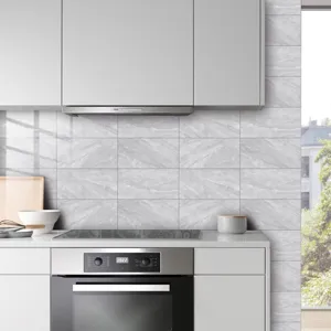 Gray marble crystal film tile sticker detail, self-adhesive kitchen wall decor surface.