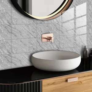 Detail shot of marble texture tile sticker in modern bathroom setting with basin.