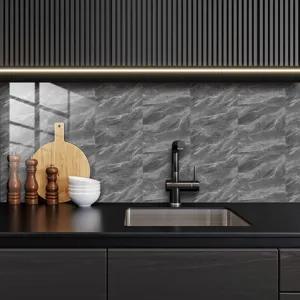 Detailed close-up view of modern gray marble texture wall sticker in a stylish kitchen setup.