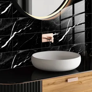 Modern black marble texture tile sticker detail featuring white ceramic basin and luxury bathroom decor.