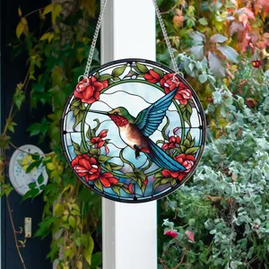 Stained glass hummingbird hanging decoration for garden wall decor with floral design.