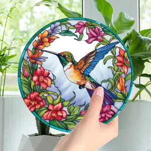 Round stained glass hummingbird wall hanging, vibrant floral window decor art piece.