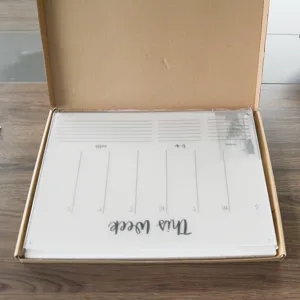 Transparent acrylic weekly planner board with mounting hardware for home and office organization.