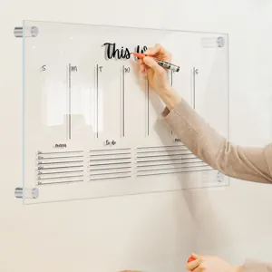Clear acrylic weekly planner dry erase board for wall mounting with hardware included.