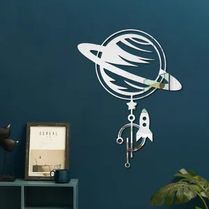 Detailed view of 3D acrylic mirror wall sticker featuring planet and rocket shapes for home decor.