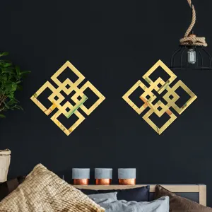 Detail view of gold geometric acrylic wall mirror sticker, chic home decor accent for modern walls.