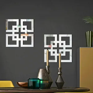 Detailed view of geometric acrylic mirror wall stickers displayed in a modern home interior scene.
