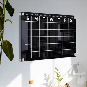 Acrylic wall calendar memo board detail view, clear erasing weekly planning display panel.