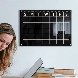 Clear black acrylic wall calendar dry erase monthly planner board for office and home decor.