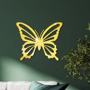 Gouden acryl spiegel holle vlinder muursticker perfect voor moderne slaapkamerinrichting.
