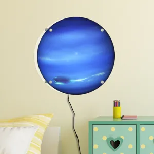 Detailed view of the glowing Neptune wall lamp mounted in a cozy room, showcasing lighting.