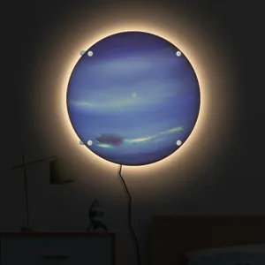 LED planet wall lamp detail showing glowing blue gaseous design and mounting structure.