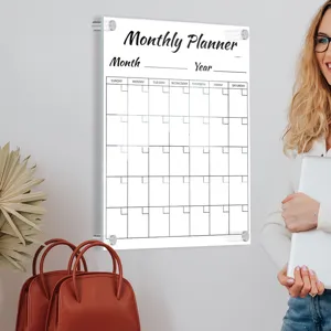 Clear acrylic monthly planner wall calendar board for office and home organization.
