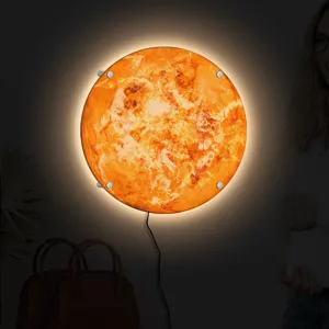 3D LED glowing planet wall lamp with unique textured surface and warm ambient lighting.