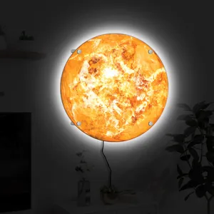Detailed view of the 3D glowing planet wall lamp showing vibrant sun texture and soft halo light.