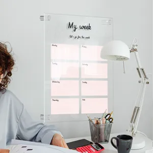 Clear acrylic weekly planner dry erase board for wall mount office home schedule organization.