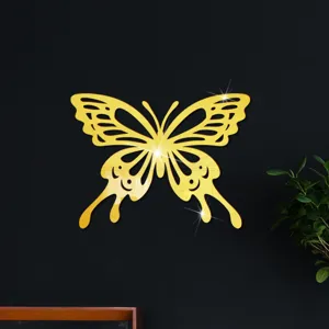 Gouden acryl spiegel holle vlinder muursticker detail voor decoratie van de slaapkamer.